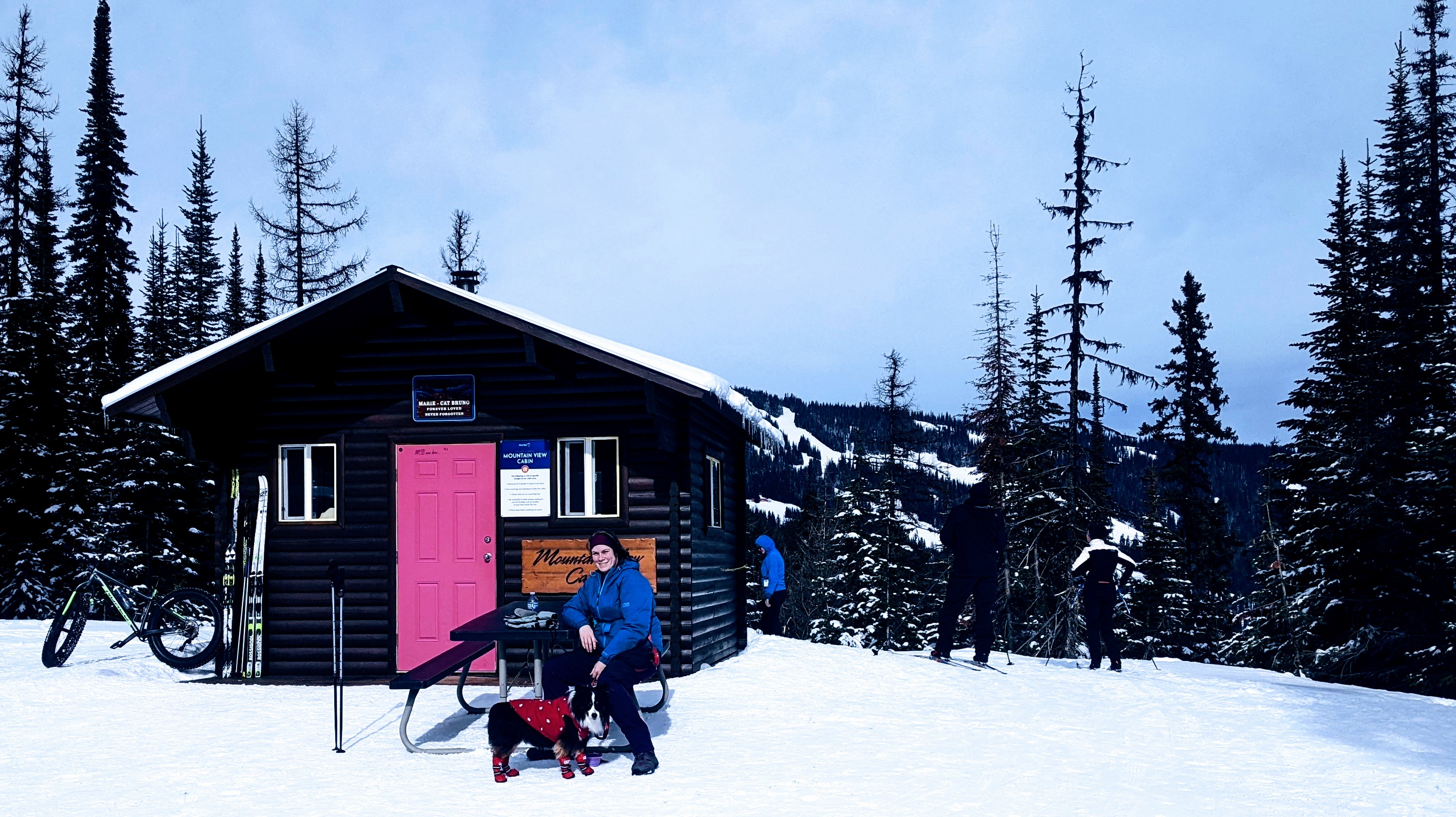 Small cabin in the snow, Silver Star mountain in the distance